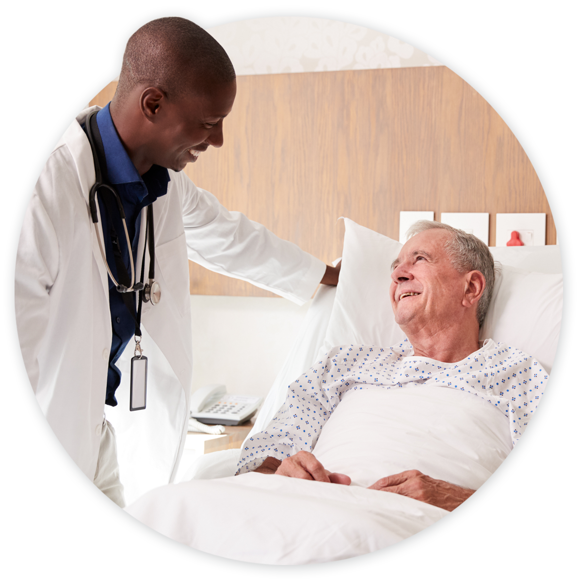 Cardiology-hero Doctor talking to cardiology patient in hospital bed