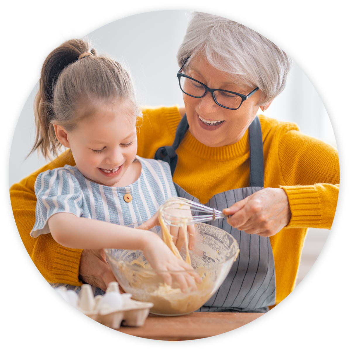 clinical-close-gaps-in-care-hero4 Grandmother smiling and baking with happy granddaughter