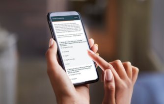 SEO-image3 Closeup of person using a tailored screening intake form on mobile