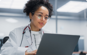 SEO-image5 Nurse using laptop to deliver custom branded messaging
